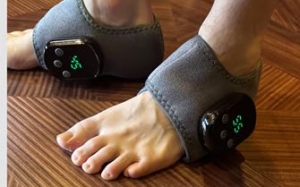 Both wraps fastened, worn at home